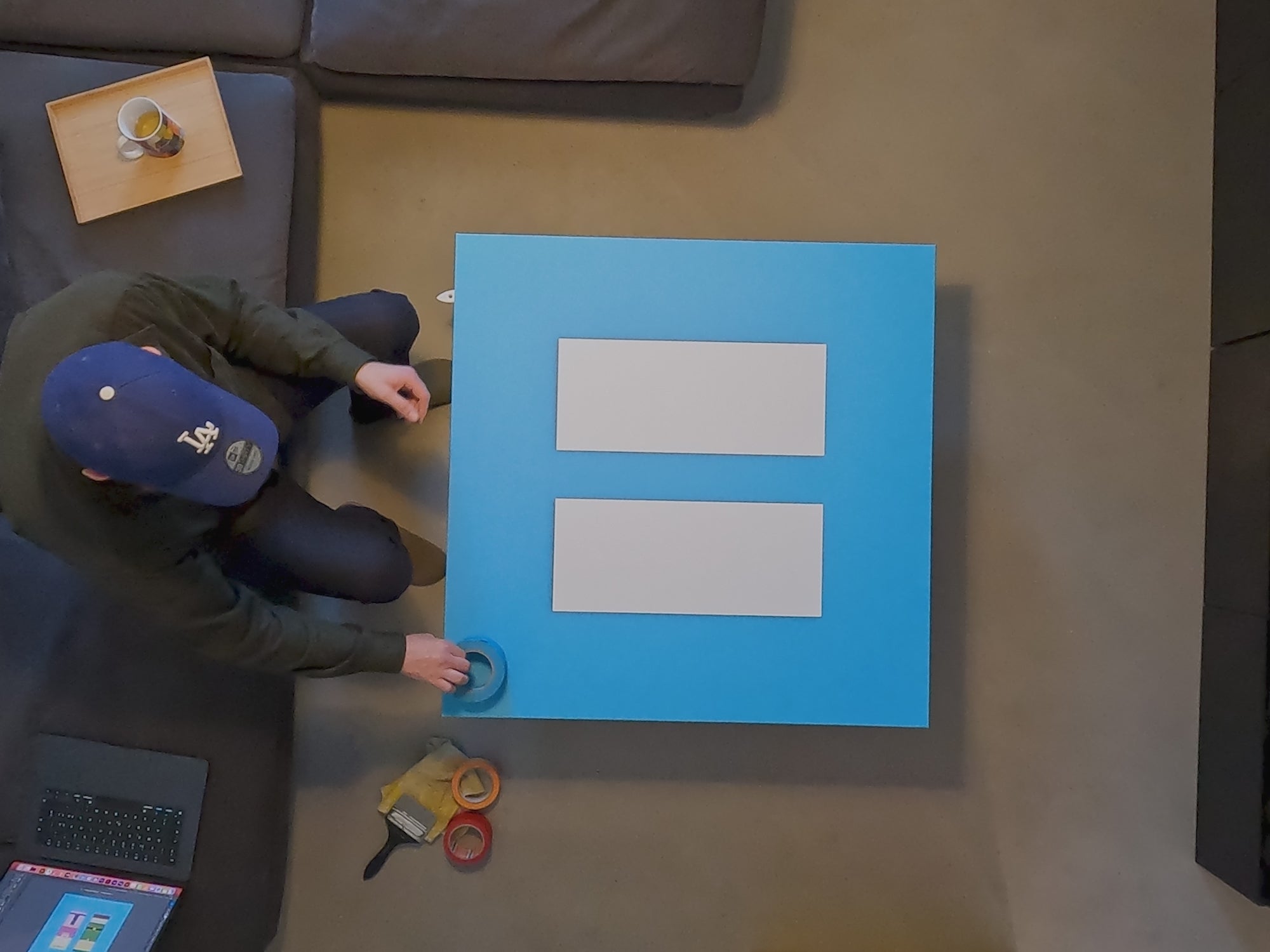 Load video: Video of Archy, painting a canvas.